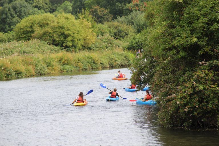 Kayakers paddling out